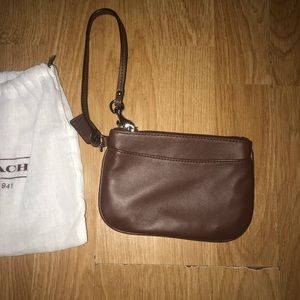 -Brown coach wristlet. NWT